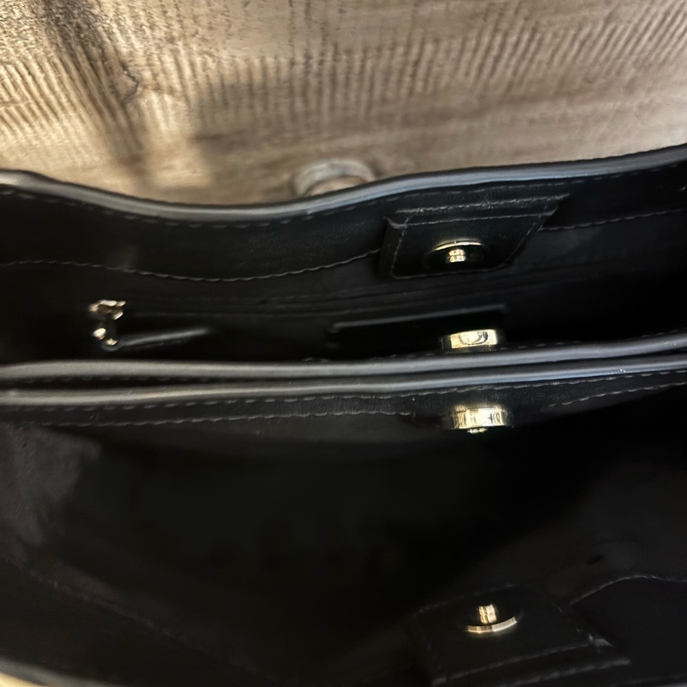 Kate Spade handbag (like new) black.  Can be shoulder or crossbody.